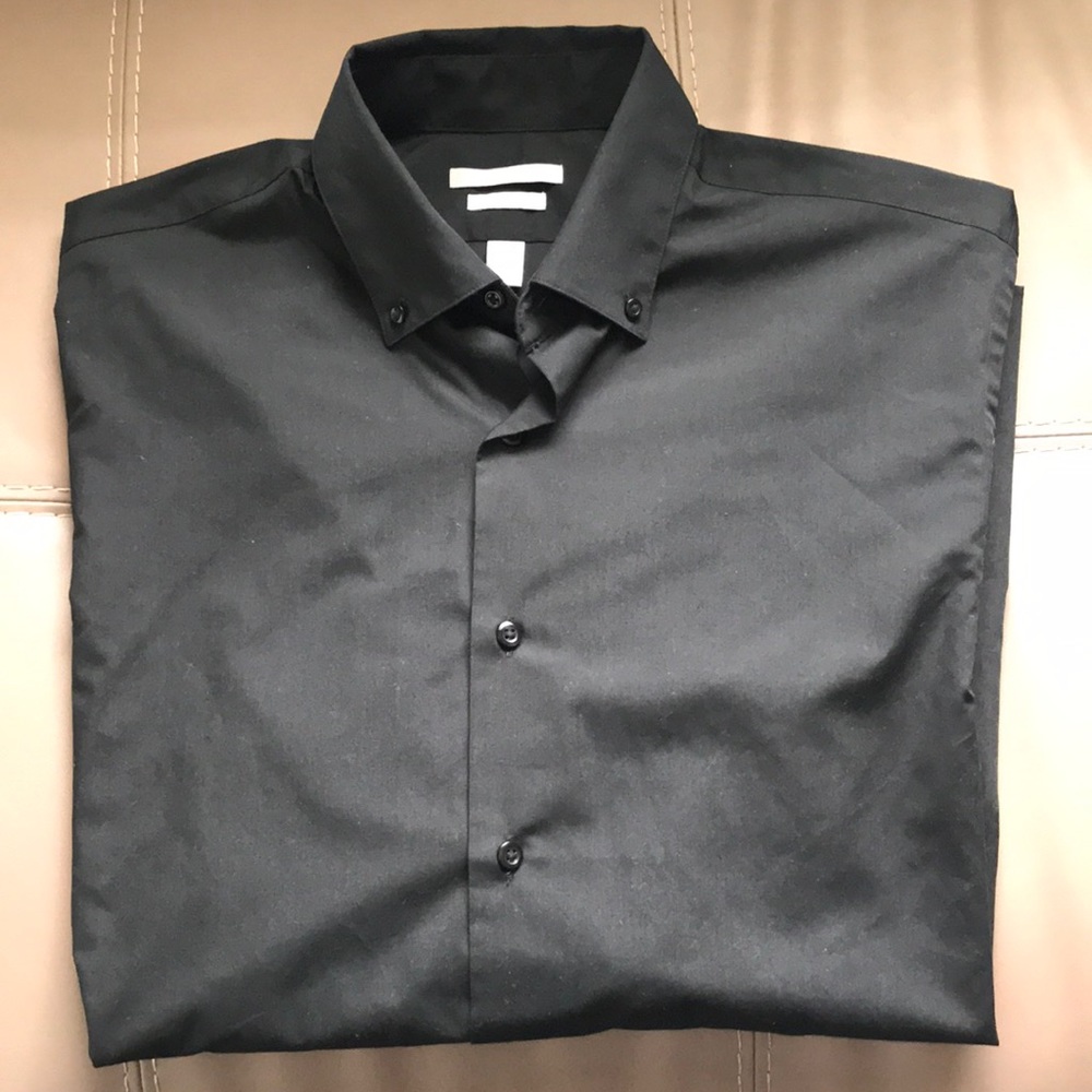 All-black Van Heusen button down dress shirt.